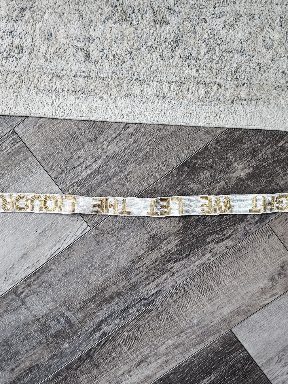 Embroidered White Ribbon Strap with Gold Lettering